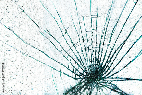 Shattered glass window against a white background