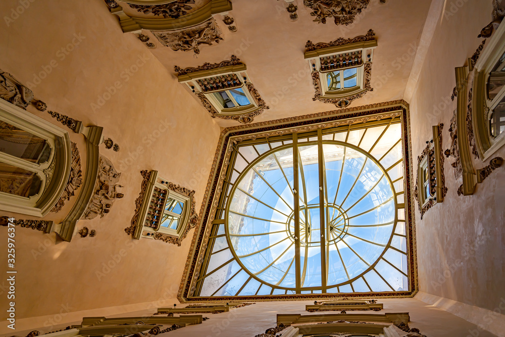 Fototapeta premium The glass roof of the beautiful staircase of the Museo Nacional de Ceramica in Valencia, Spain
