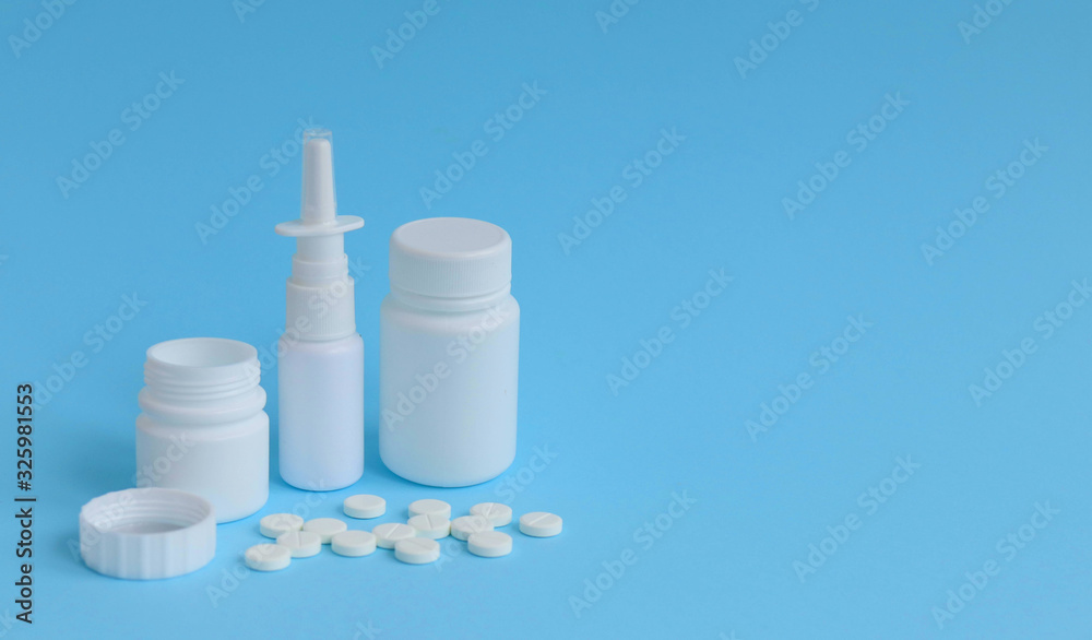 Jars with medicines, tablets and capsules, concept of medicine space for text Jars with medicines, tablets and capsules, concept of medicine space for text