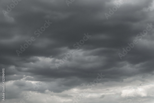 Dark storm clouds before rain used for climate background. Clouds become dark gray before raining.