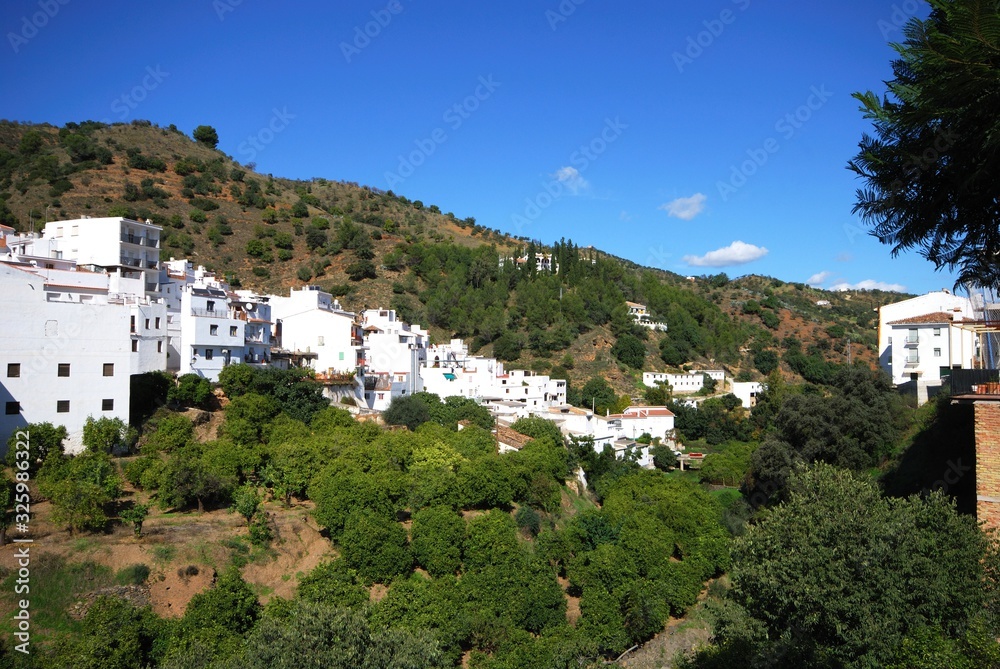 View of the edge of the town and surrounding countryside, Tolox, Spain.