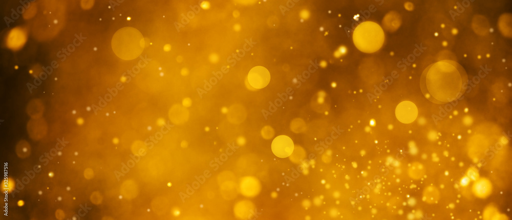 Abstract golden background with bokeh effect Abstract golden background with bokeh effect