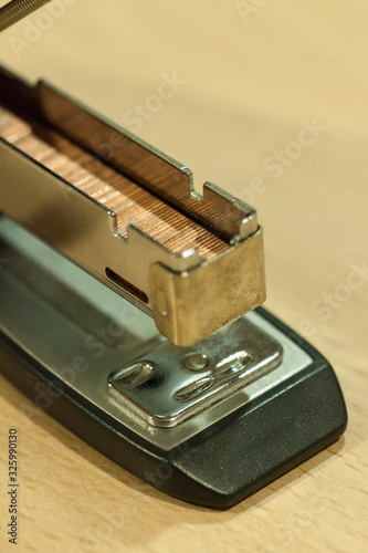 open stapler on table