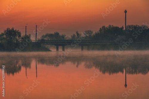 Sunrise on river © ghostdom