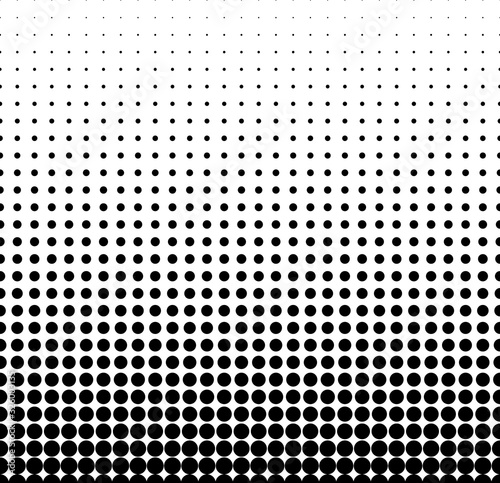 Seamless halftone vector background.Average fade out.Black circles.