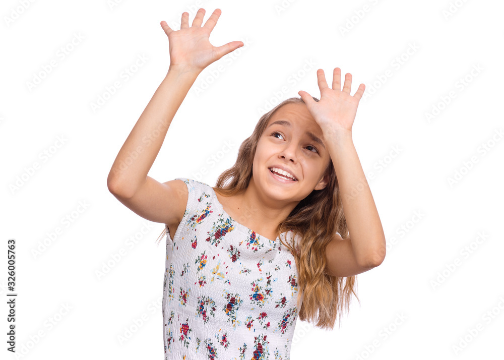 Frightened teen girl shaking from fear and holding hands in defensive gesture. Child with long hair, isolated on white background. Teenager with outstretched hands from something. Frightened teen girl shaking from fear and holding hands in defensive gesture. Child with long hair, isolated on white background. Teenager with outstretched hands from something.