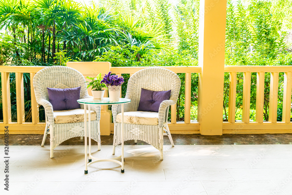 Fototapeta premium patio chair and table decoration on balcony