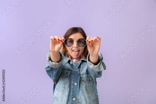 Happy woman with stylish su...