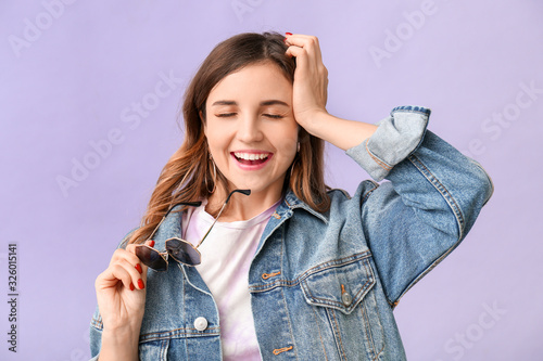 Happy woman with stylish su...