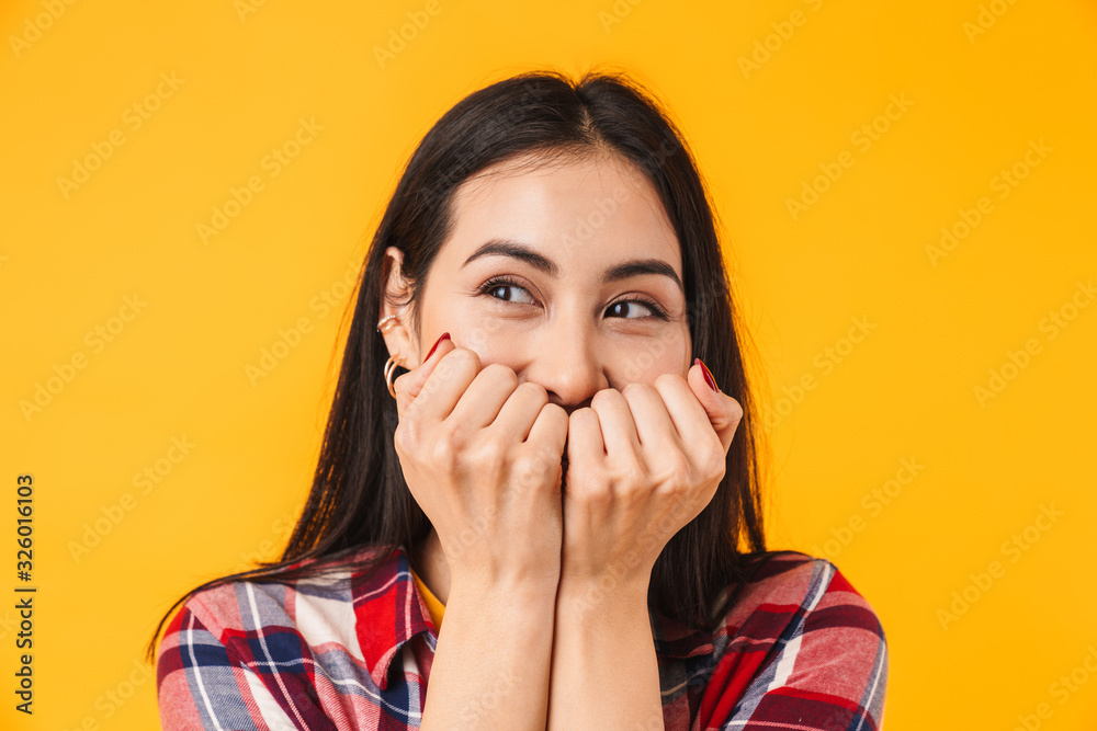 Image of happy woman expressing surprise and covering her mouth Image of happy woman expressing surprise and covering her mouth