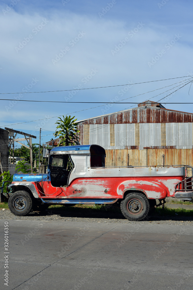 plain and undecorated jeepney