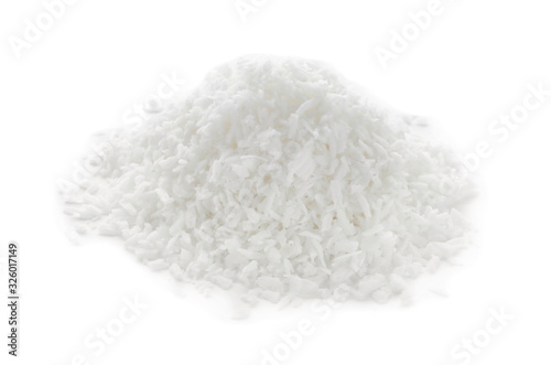 Heap of fresh coconut flakes isolated on white
