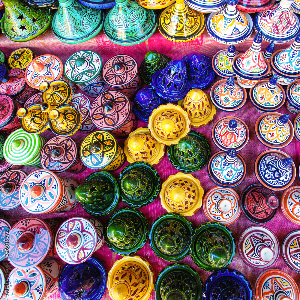 Colored Tajine, plates and pots out of clay on the market in Morocco