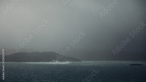Squall over bay in Scotland photo