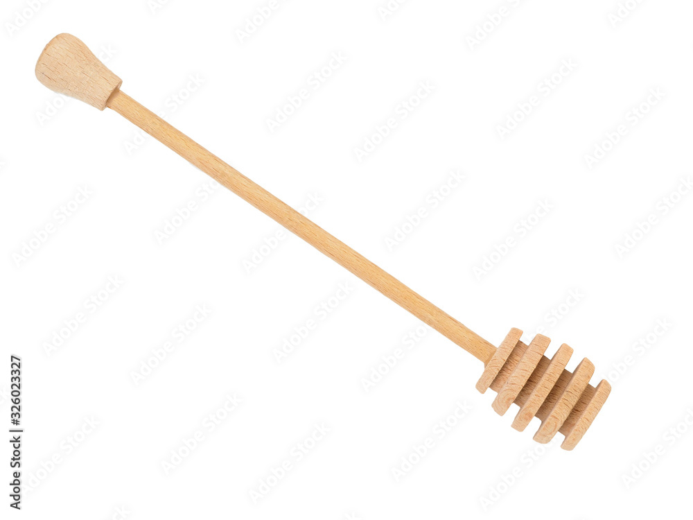 Wooden dipper for honey isolated on a white background Wooden dipper for honey isolated on a white background