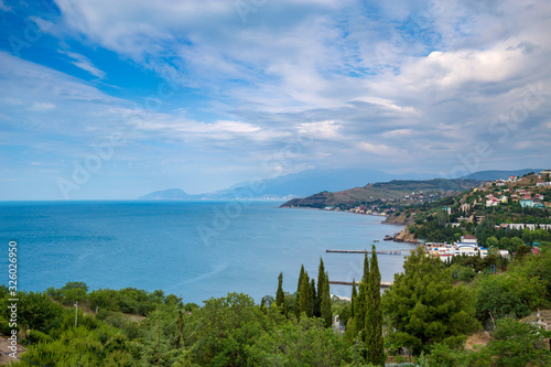 Beautiful summer sea landscape at the resort in the Crimea. Rocky coast of the black sea. Seascape.