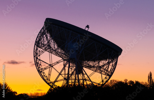 Sunrise at the Lovell Telescope at Jodrell Bank in the Cheshire landscape - a UNESCO World Heritage Site. Radio Telescope Centre for Astrophysics at the University of Manchester