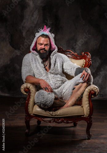 adult man with a beard in funny pajamas