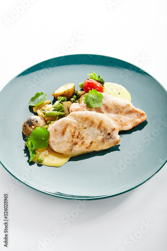 Chicken fillet with vegetables and cream sauce