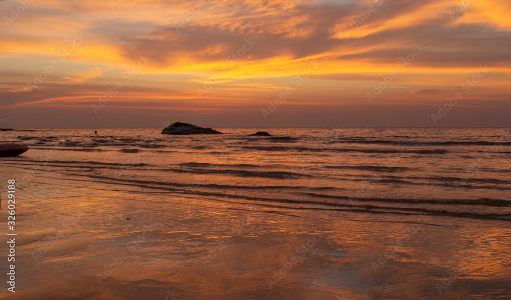 stunning sunset in a tropical beach in South east asia