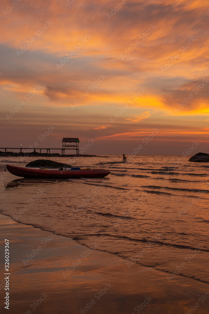 stunning sunset in a tropical beach in South east asia