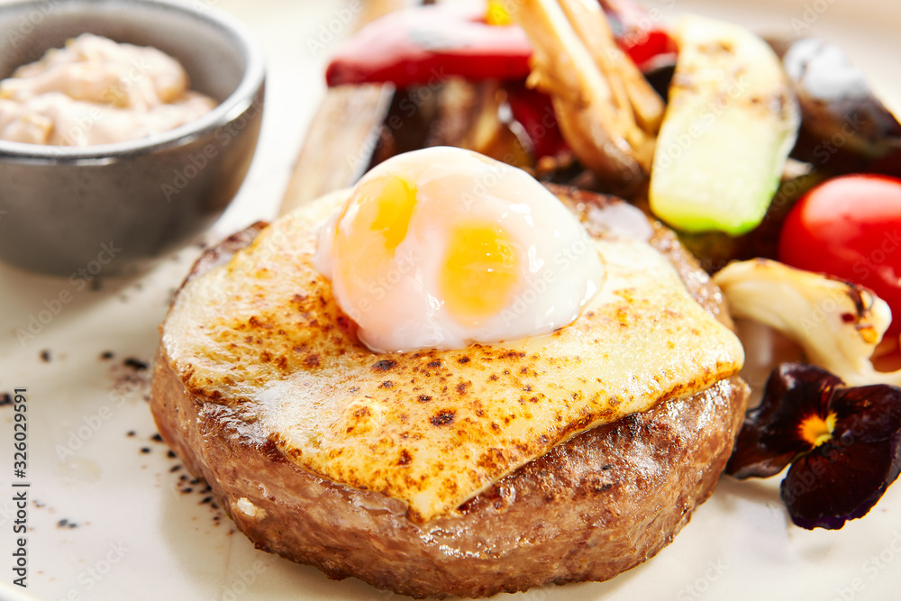 Steak with sous vide egg and baked vegetables Steak with sous vide egg and baked vegetables