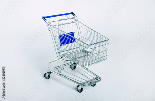 Empty shopping cart isolated on white background.