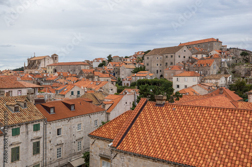 View of Dubrovnik old town buildings and red roofs from the city wall