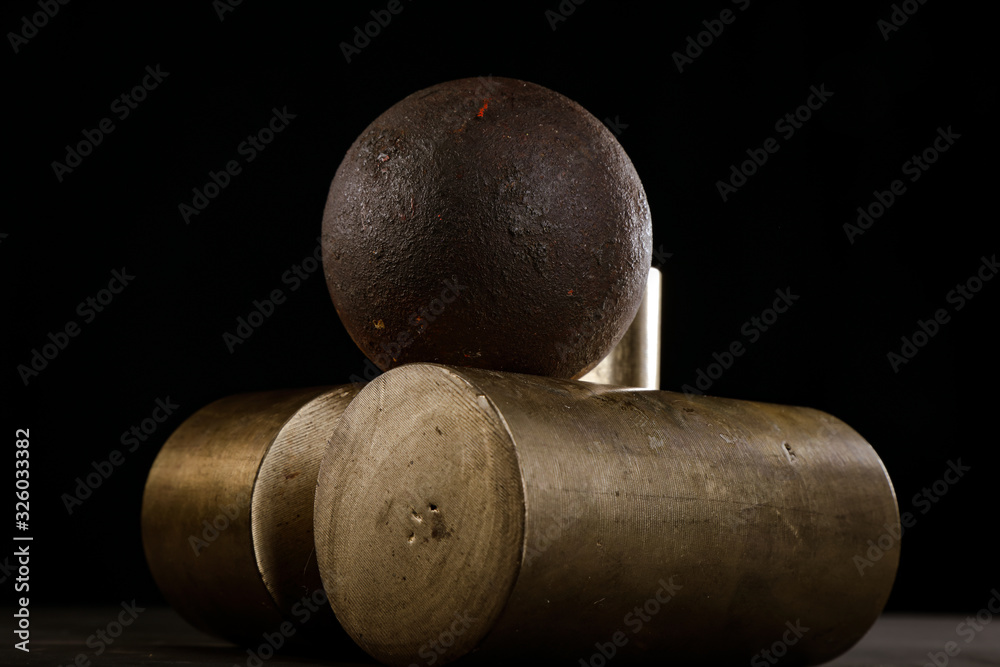 voluminous metal products on a dark background voluminous metal products on a dark background