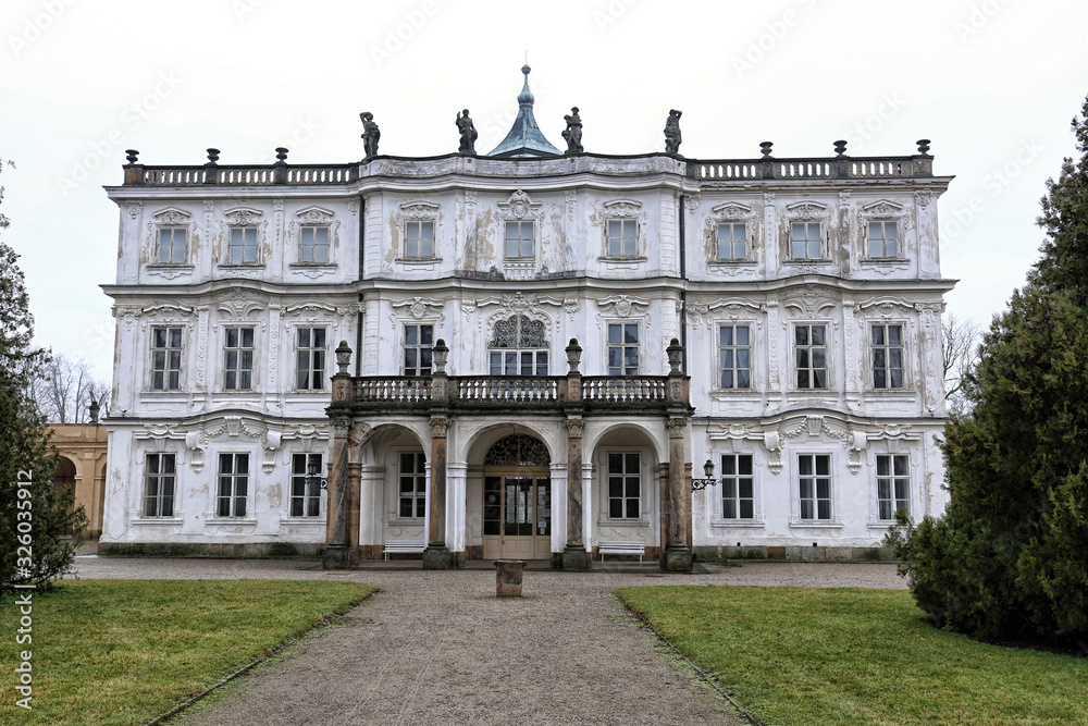 Frontal facade of Ploskovice chateau with balcony