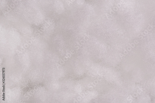 Sintepon texture closeup. Synthetic winterizer background. photo