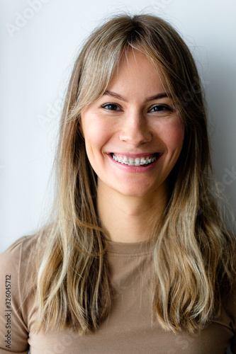 Portrait of a young woman in braces