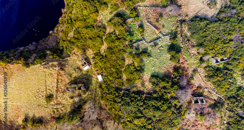 Obraz premium Aerial view of abandoned town at Drumboghill between Rossbeg and Portnoo in County Donegal - Ireland