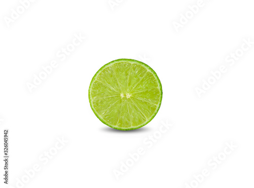 hafl cut ripe green lime on white background photo