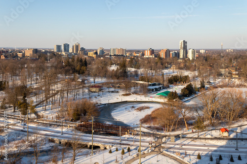 Aerial View of a snow covered city park in winter