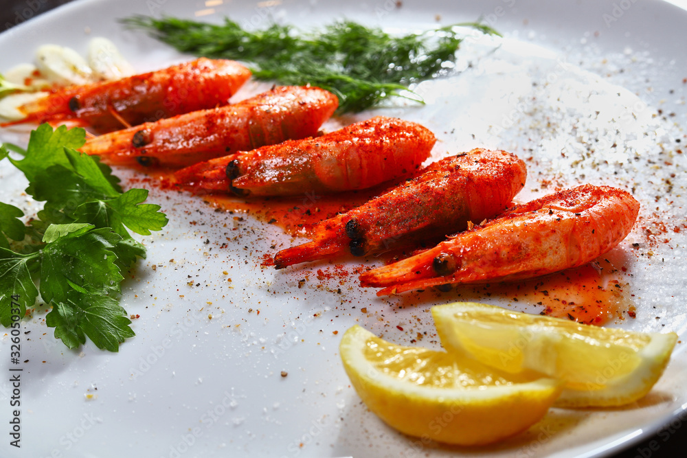 fried shrimp with various spices, lemon and sauce fried shrimp with various spices, lemon and sauce