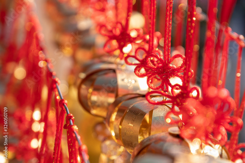 Chinese bell at Wen Wu Temple with prayers which means good luck Good health, prosperity