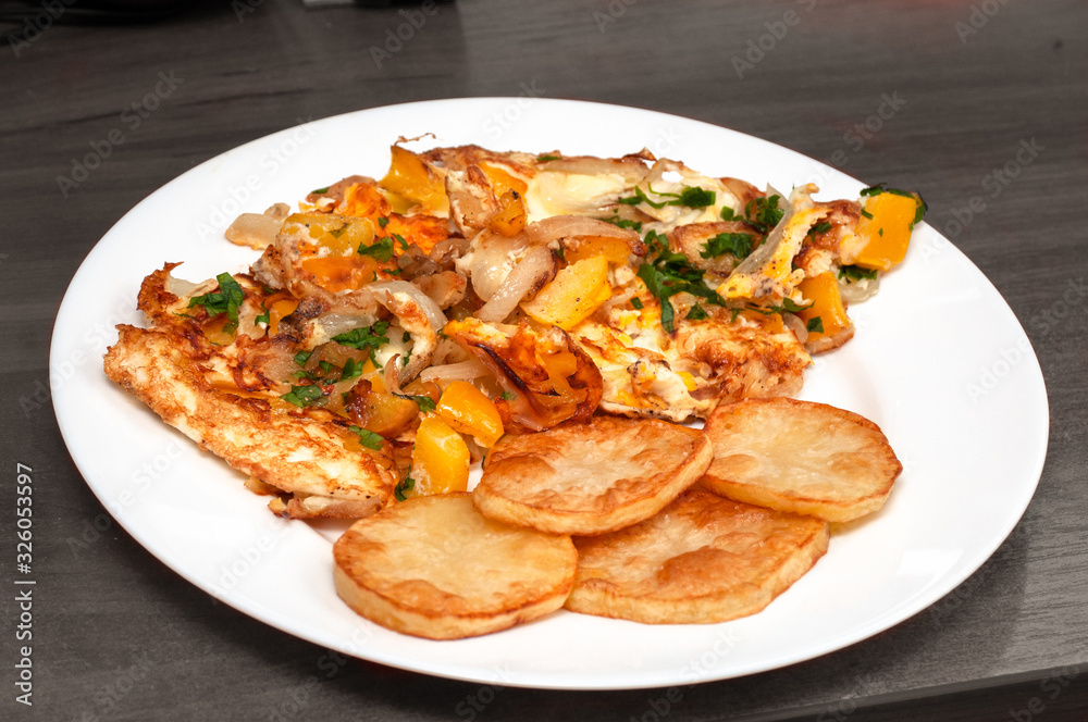 omelet with vegetables, fried potatoes. homemade food omelet with vegetables, fried potatoes. homemade food