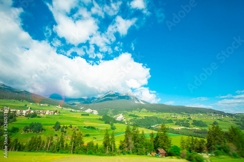 Alps  Switzerland in spring with bright blue skies and beautiful clouds