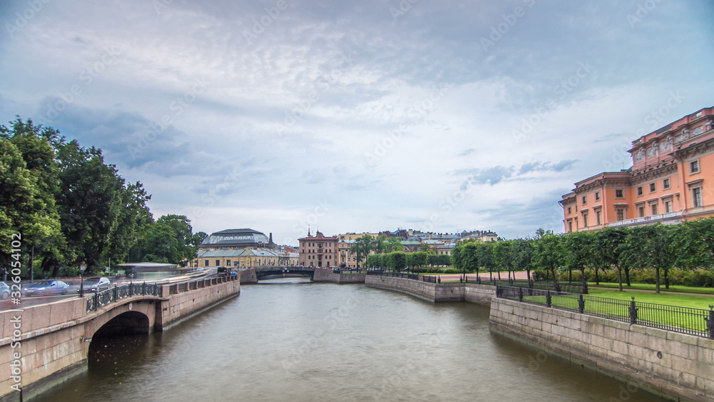 View of the Embankment of the river Moyka and Mikhailovsky Castle timelapse . Saint Petersburg. Russia.