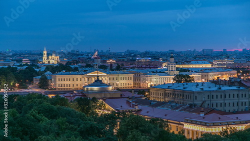 Building of Kunstkamera and the cityscape night to day timelapse viewed from the colonnade of St. Isaac's cathedral.