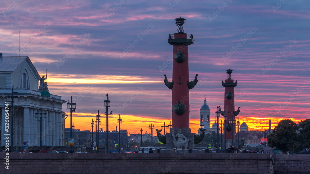 Sunset over Strelka - Spit of Vasilyevsky Island with the Old Stock Exchange and Rostral Columns timelapse in Saint Petersburg, Russia