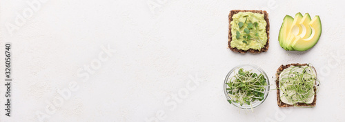 Vegetarian sandwiches with tofu, microgreen and avocado slices