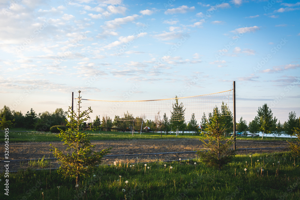 Obraz premium White net for playing volleyball on the beach.