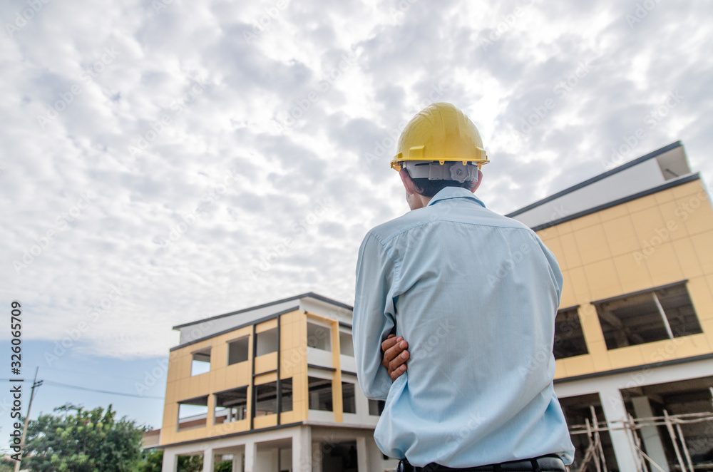 construction engineer standing at construction site construction engineer standing at construction site