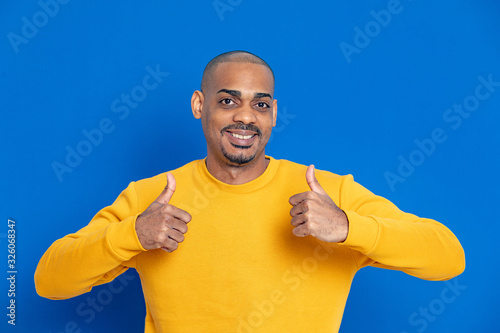 African guy with a yellow jersey