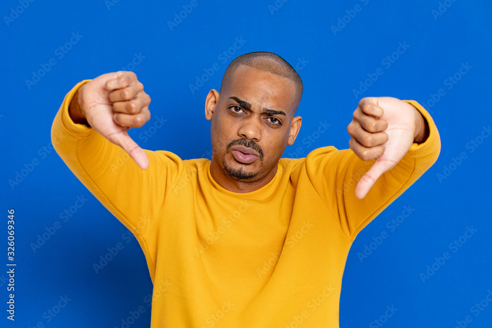 African guy with a yellow jersey African guy with a yellow jersey