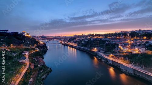 Day to Night view of the historic city of Porto  Portugal timelapse with the Dom Luiz bridge