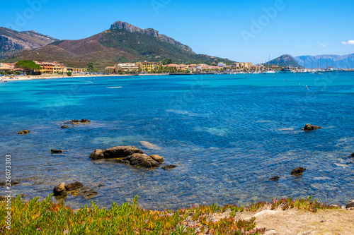Golfo Aranci, Sardinia, Italy - Panoramic view of Golfo Aranci harbor and beach - Spiaggia di Golfo Aranci - with Monte Ruju mount at the Tyrrhenian Sea coast