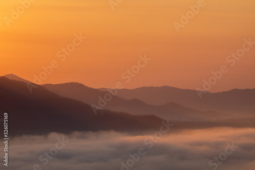 The sunrise with mountains and clouds © Thamrong